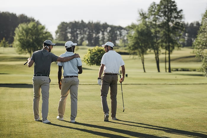 golfers having fun on the golf course